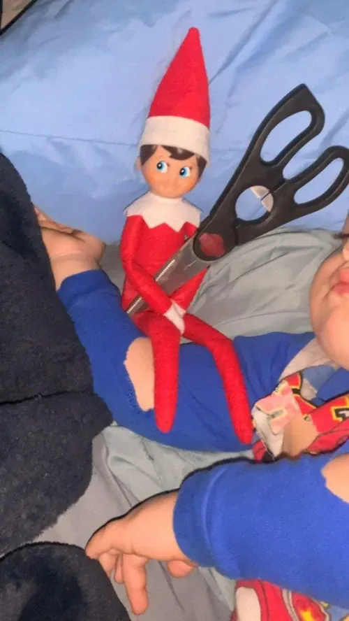 Cut holes in child's pj's