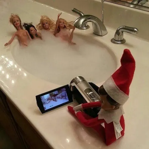 Naughty Elf On The Shelf filming babes in the bath tub