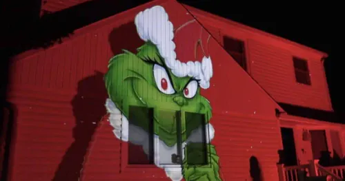 Prepare to have your mind blown with this Grinch house display