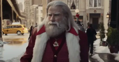 John Travolta become Santa Claus in new Christmas ad